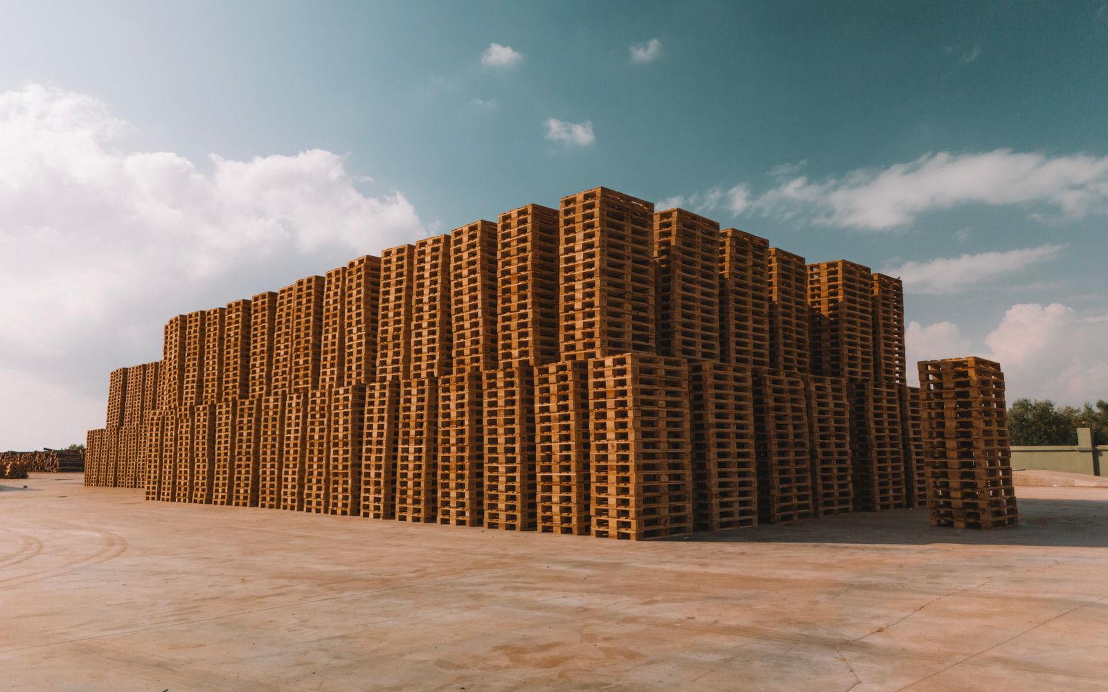 Stacks of newly manufactured pallets
